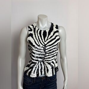 VINTAGE SIMON CHANG - Zebra sequin sleeveless peplum top.